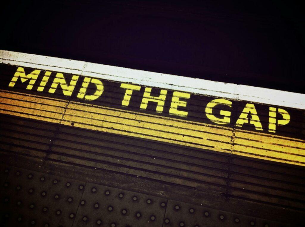 Mind the Gap Signage to emphasize the care needed when dealing with finances and the need for the advice of a professional, which we are not